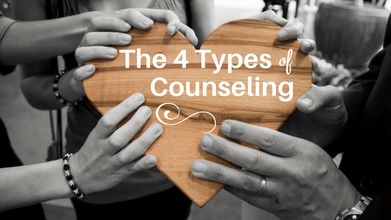 The 4 Types of Counseling, 3 people holding wood heart