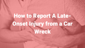 How to Report a Late-Onset Injury from a Car Wreck, Man with hands over chest