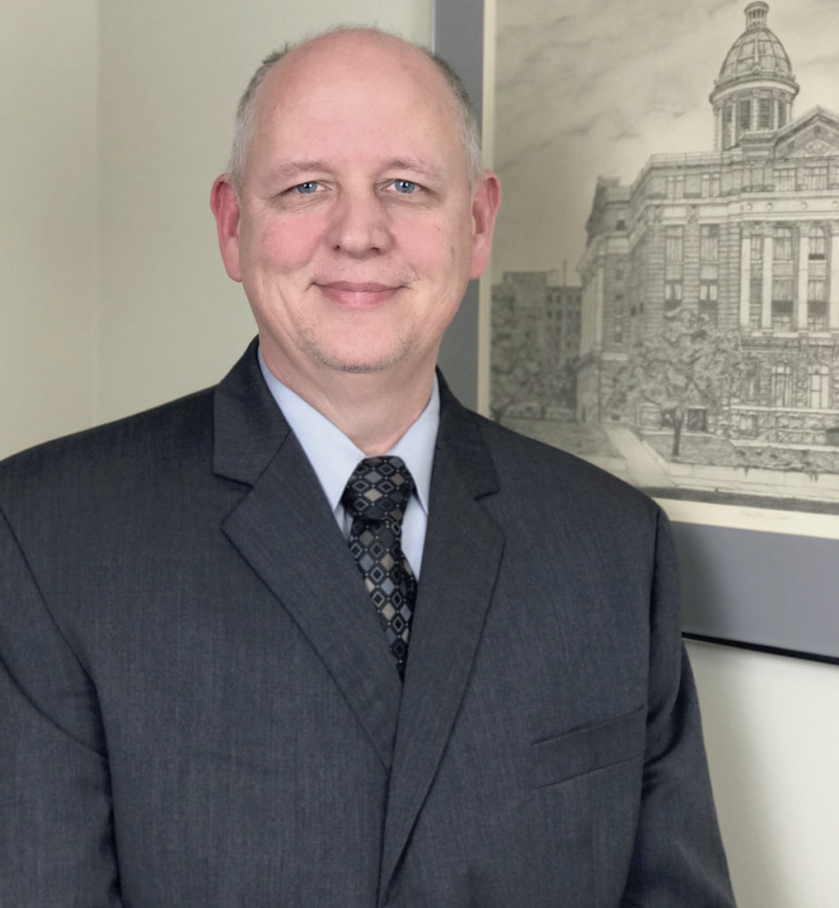 Don E. McClure, Jr. smiling