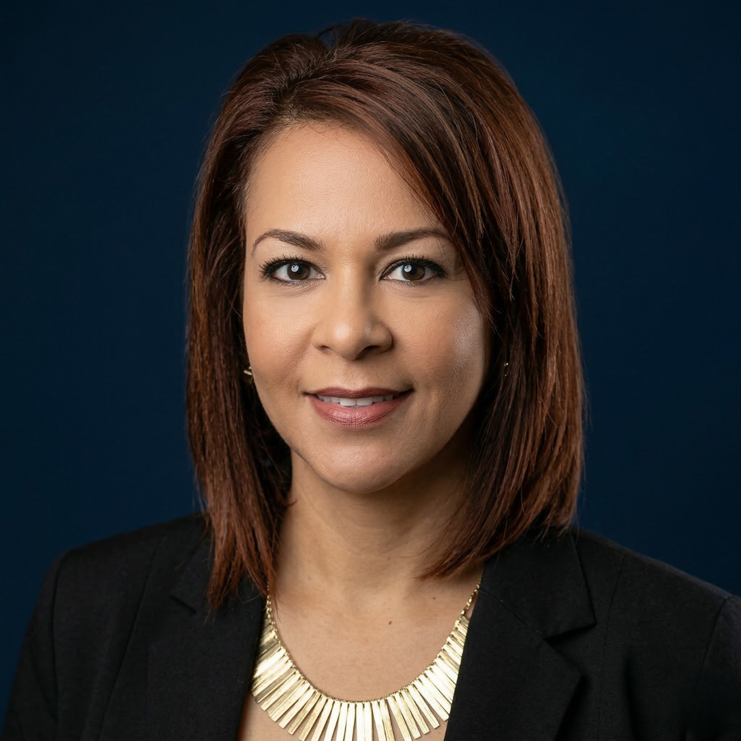 Edith McClure, Customer Relations and Office Manager at The Law Office of Don McClure, smiling in professional attire.